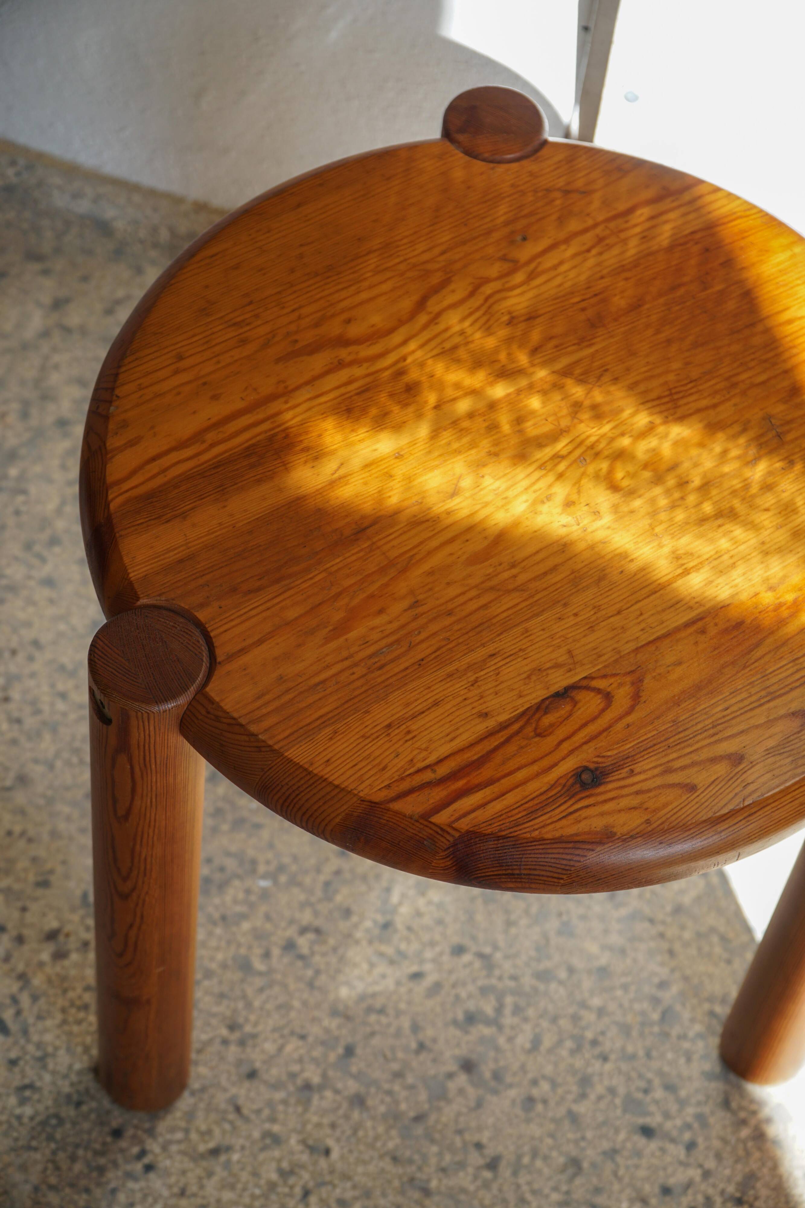 Modern Scandinavian tripod stool from the 20th century with a circular seat, 1970s.