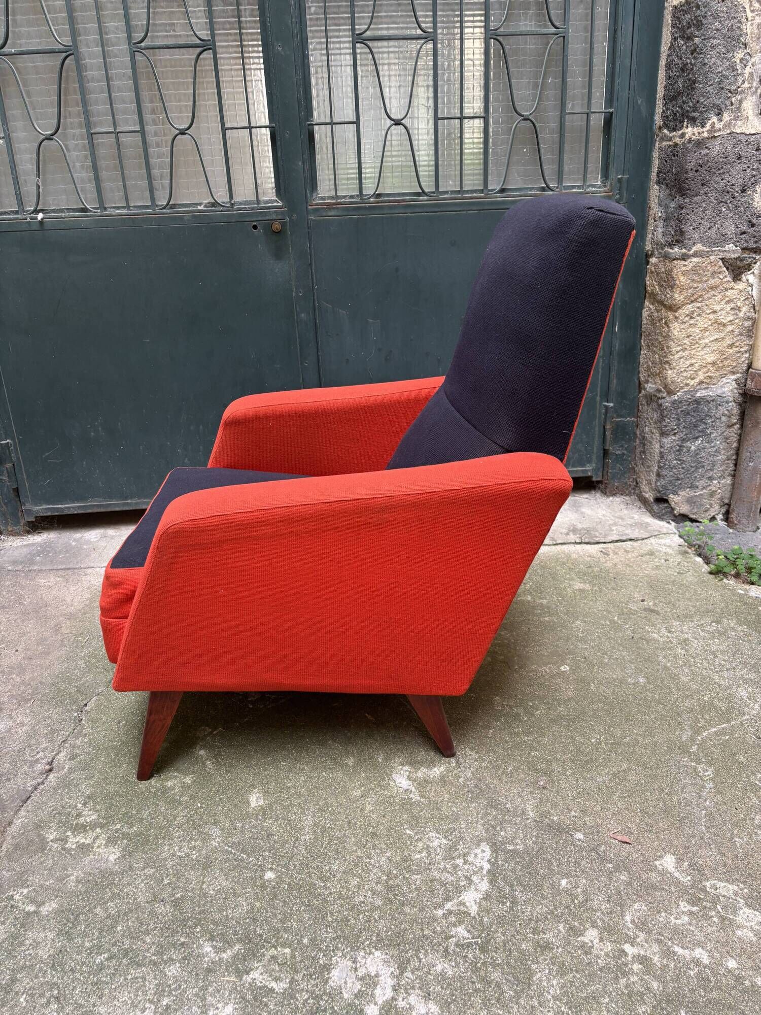 Pair of vintage black and red armchairs from the 1960s.