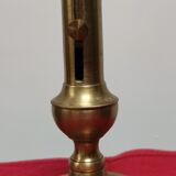 Candle holder with push button