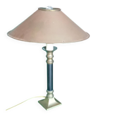Antique Empire style table lamp with a metal shade.