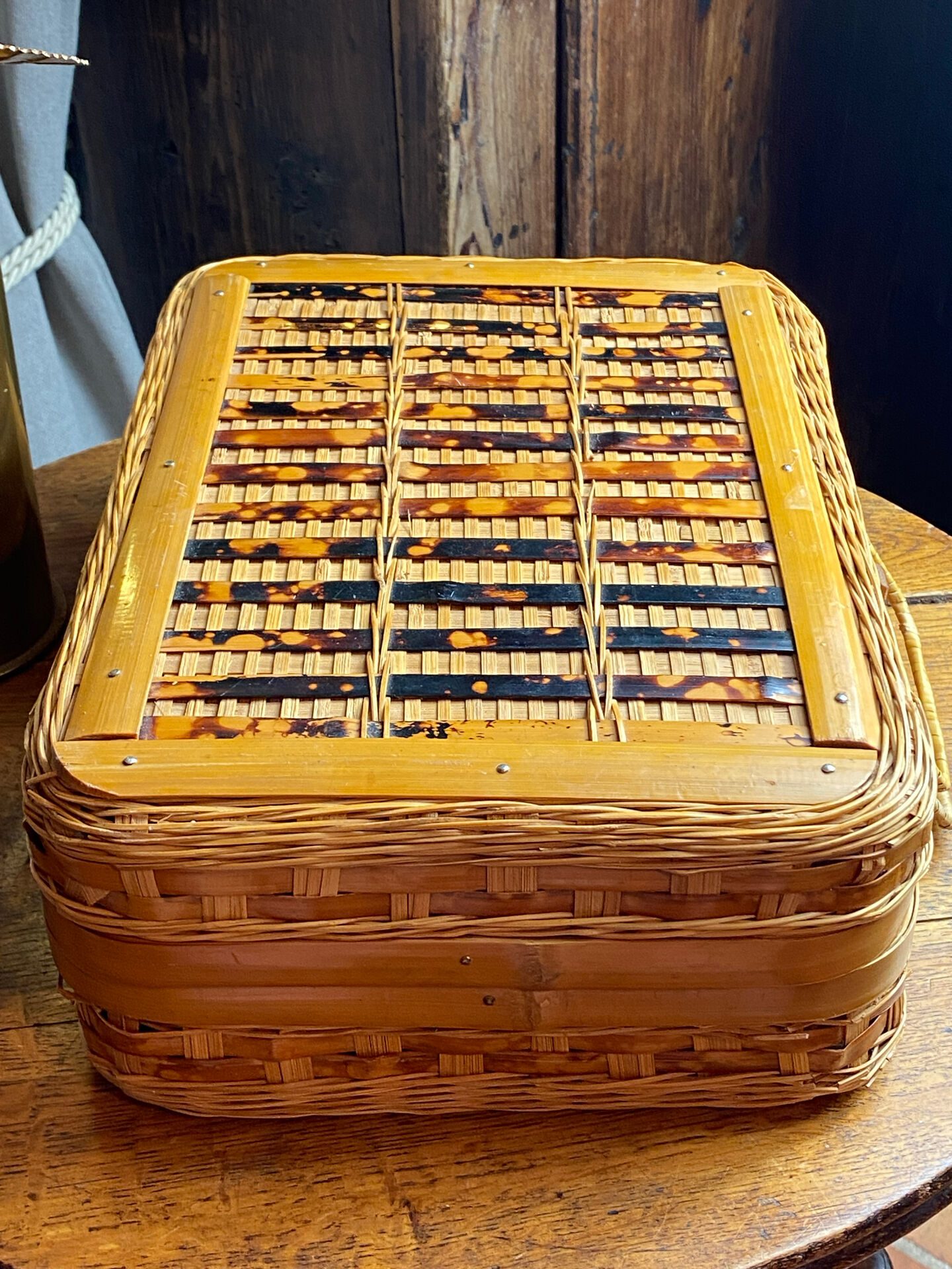 Wicker and wood suitcase