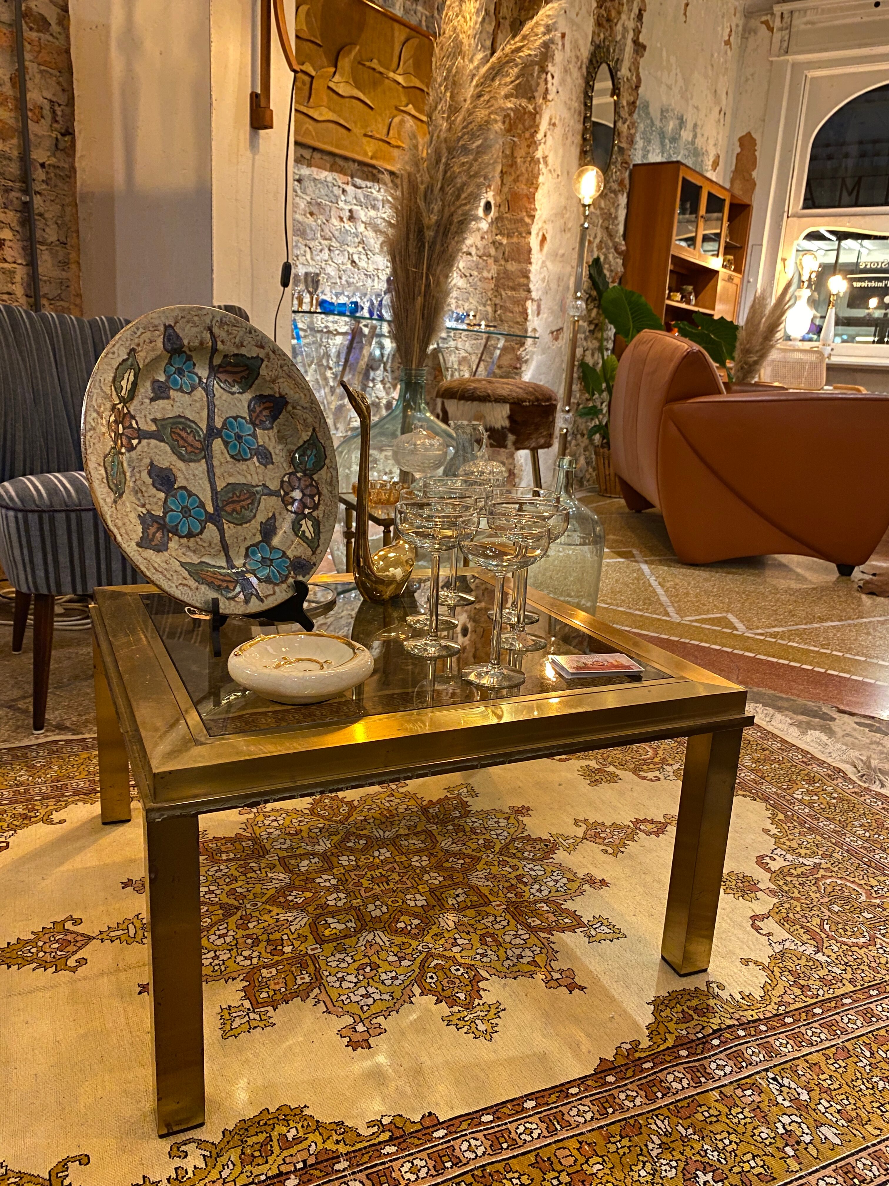 Gold square coffee table and smoked glass