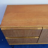 Teak sideboard from the 60s/70s pins
