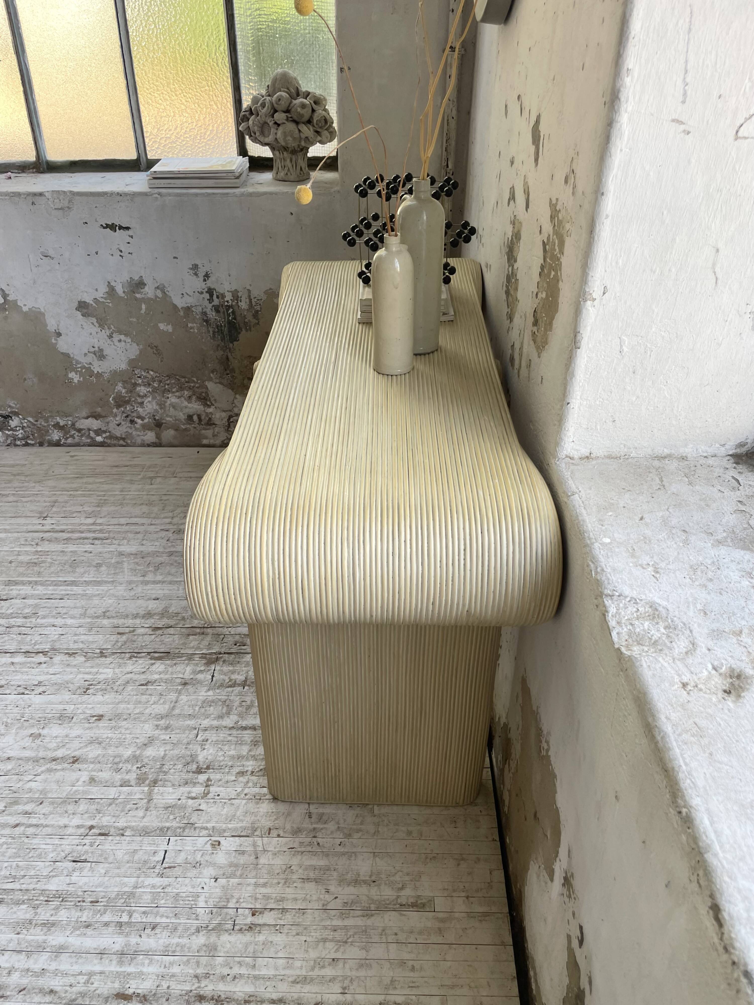 70s console in tropicalist rattan