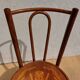 pair of bistro chairs, curved wood and pattern on the seat