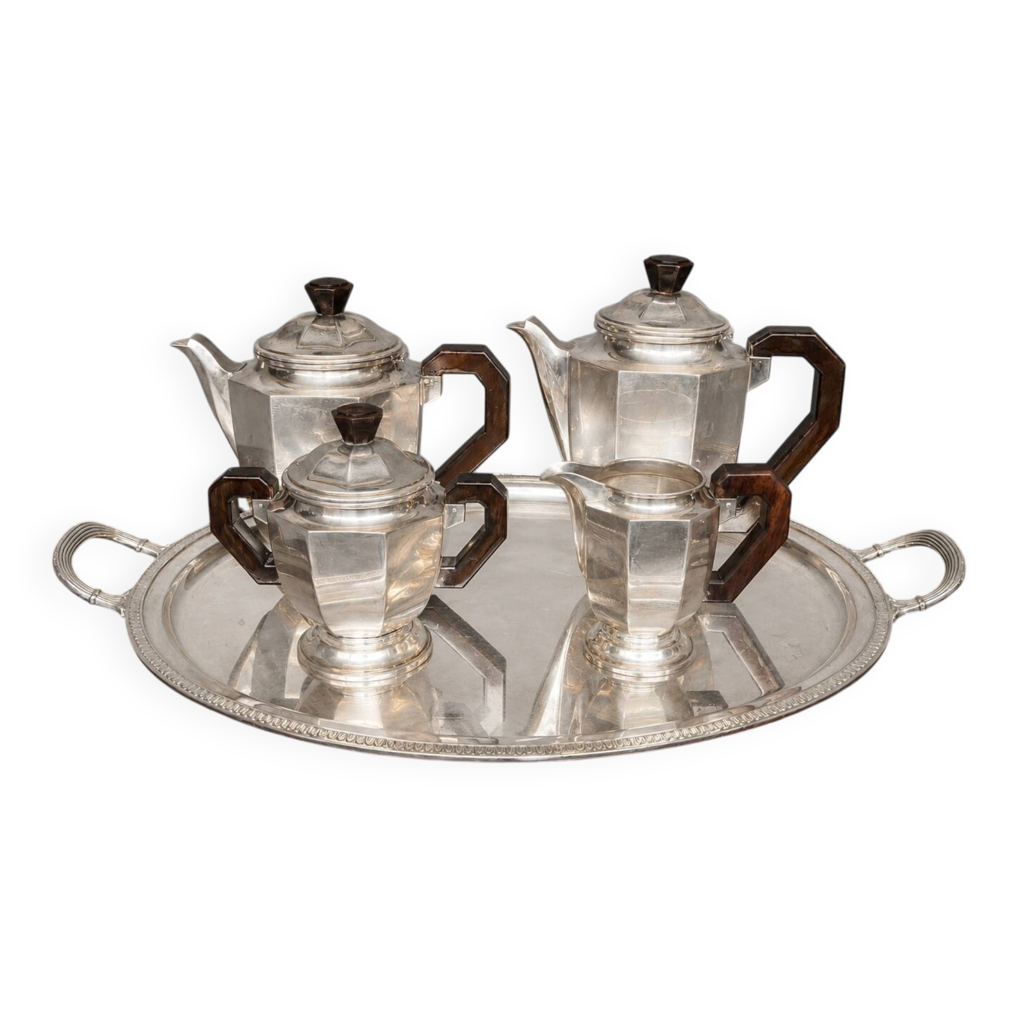 Art Deco tea and coffee service. Silver-plated metal and mahogany.