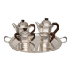 Art Deco tea and coffee service. Silver-plated metal and mahogany.