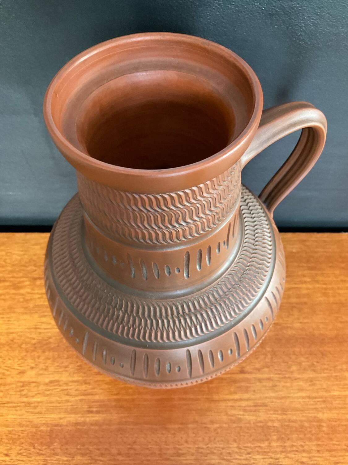 Trio of vintage vases in chiselled terracotta