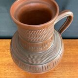 Trio of vintage vases in chiselled terracotta