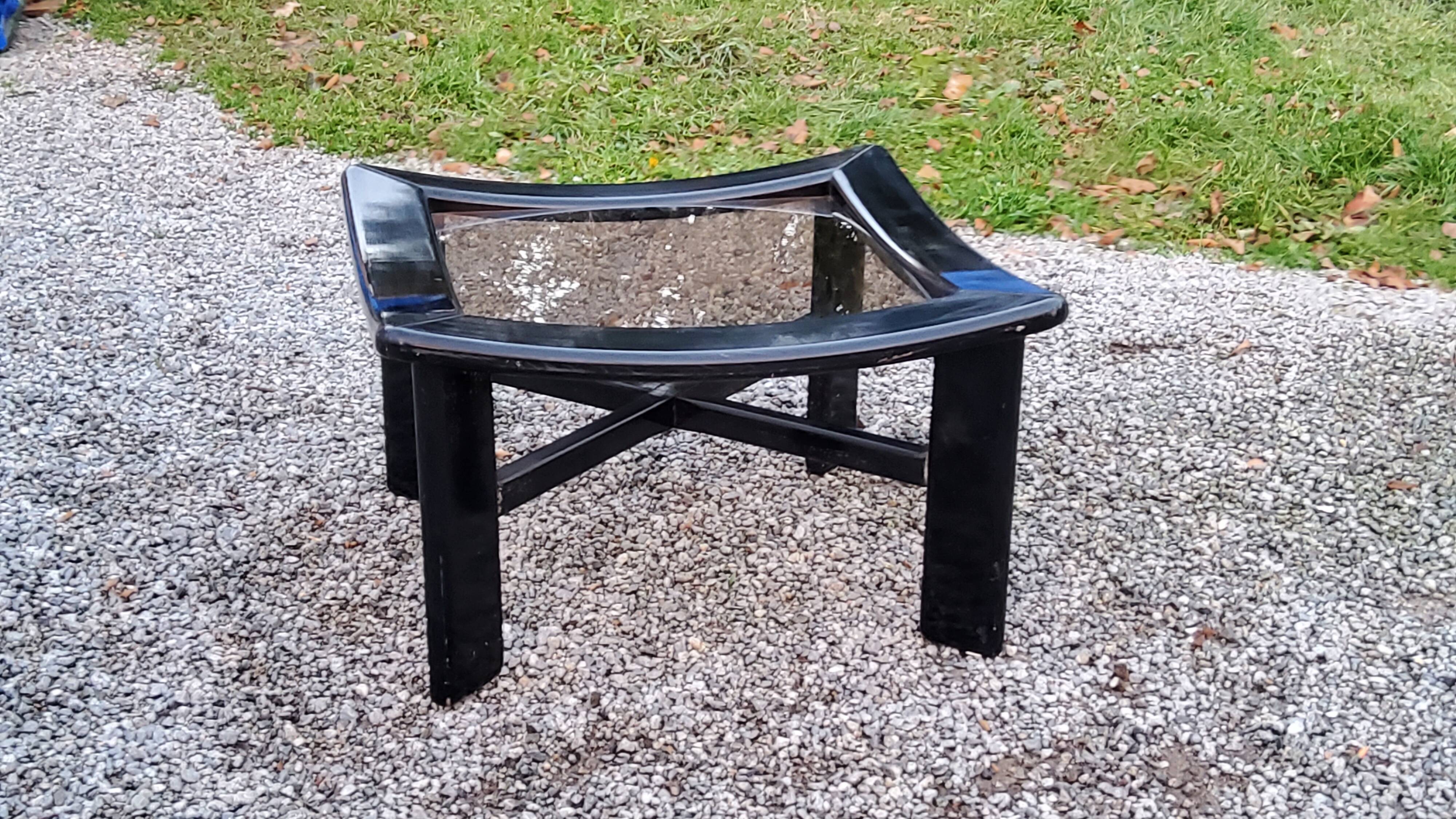 70s design coffee table in black lacquered wood with smoked glass top
