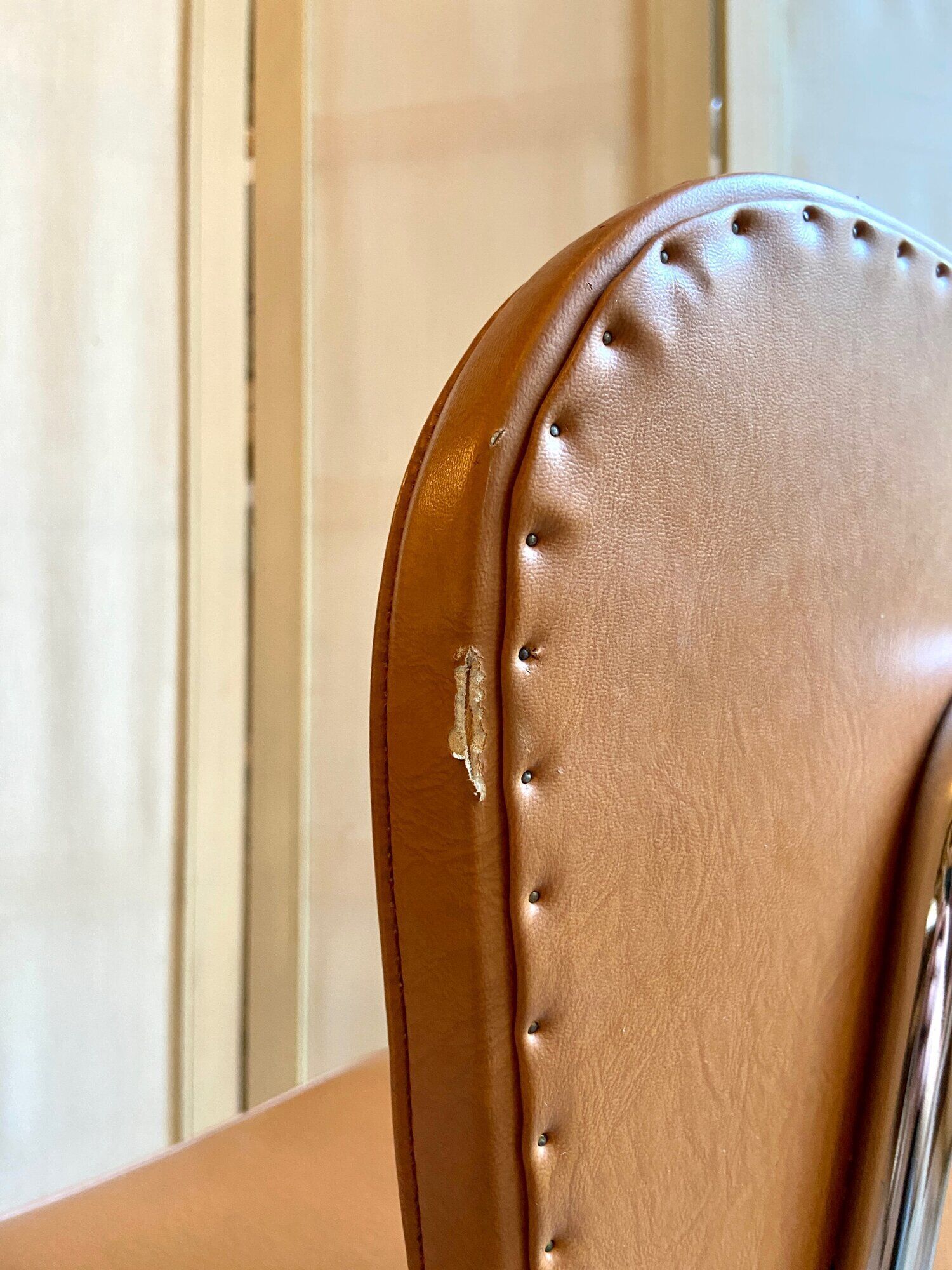 Armchair in chromed metal and tawny skaï 1950s
