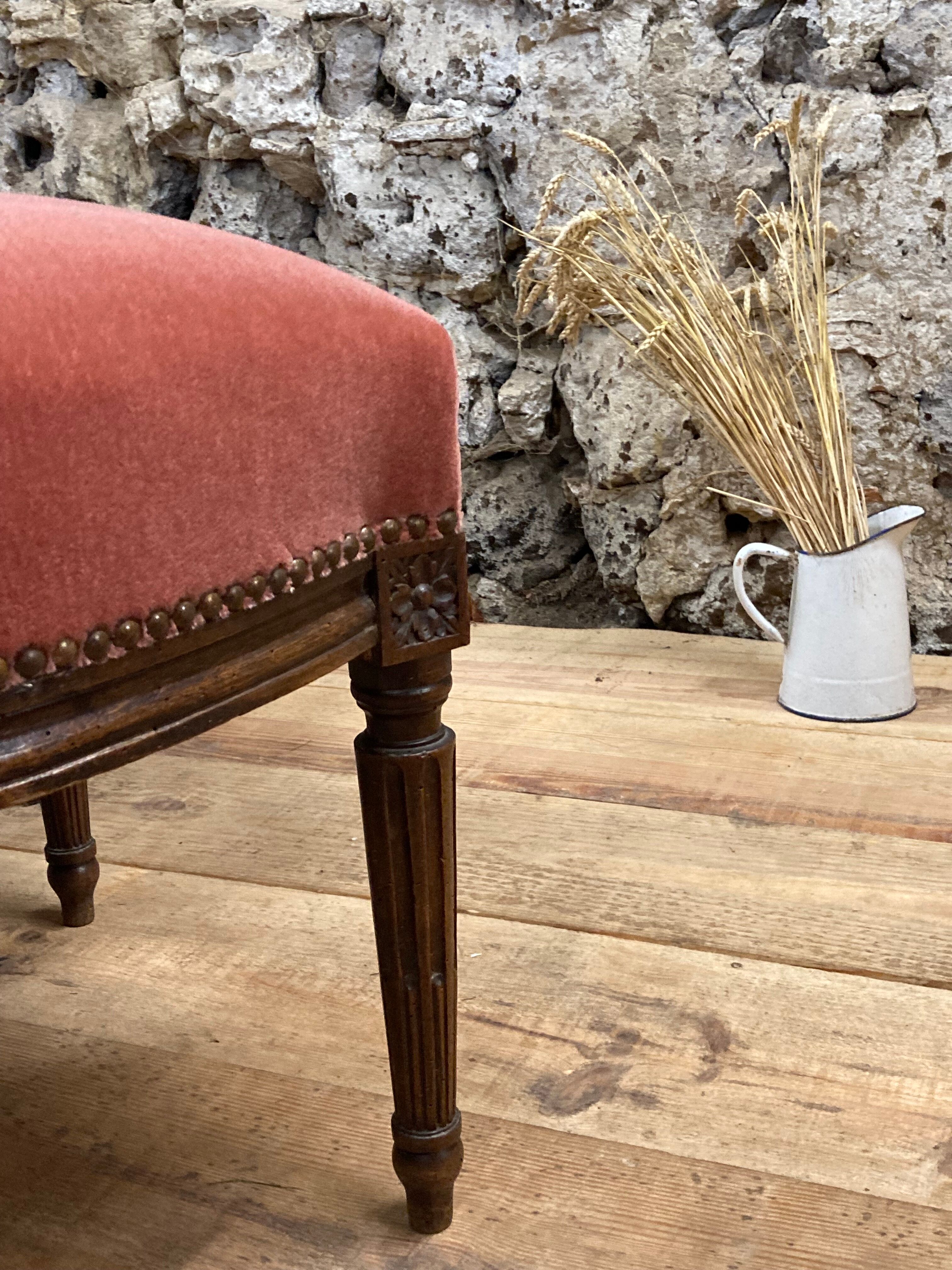 Armchair Voltaire or shepherdess and foot rest in pink velvet Louis XVI