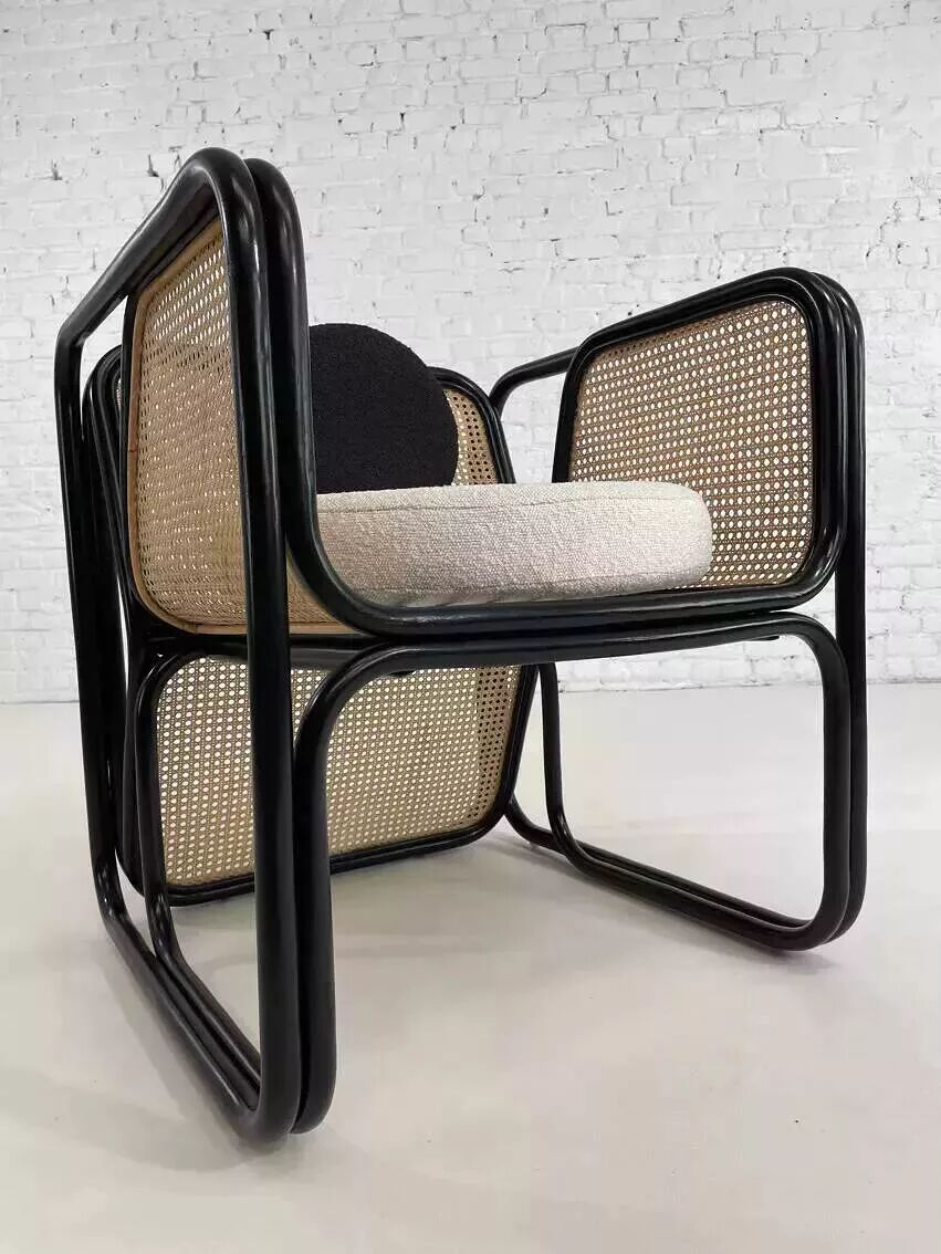 Cubic armchair in black rattan and canework