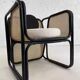 Cubic armchair in black rattan and canework