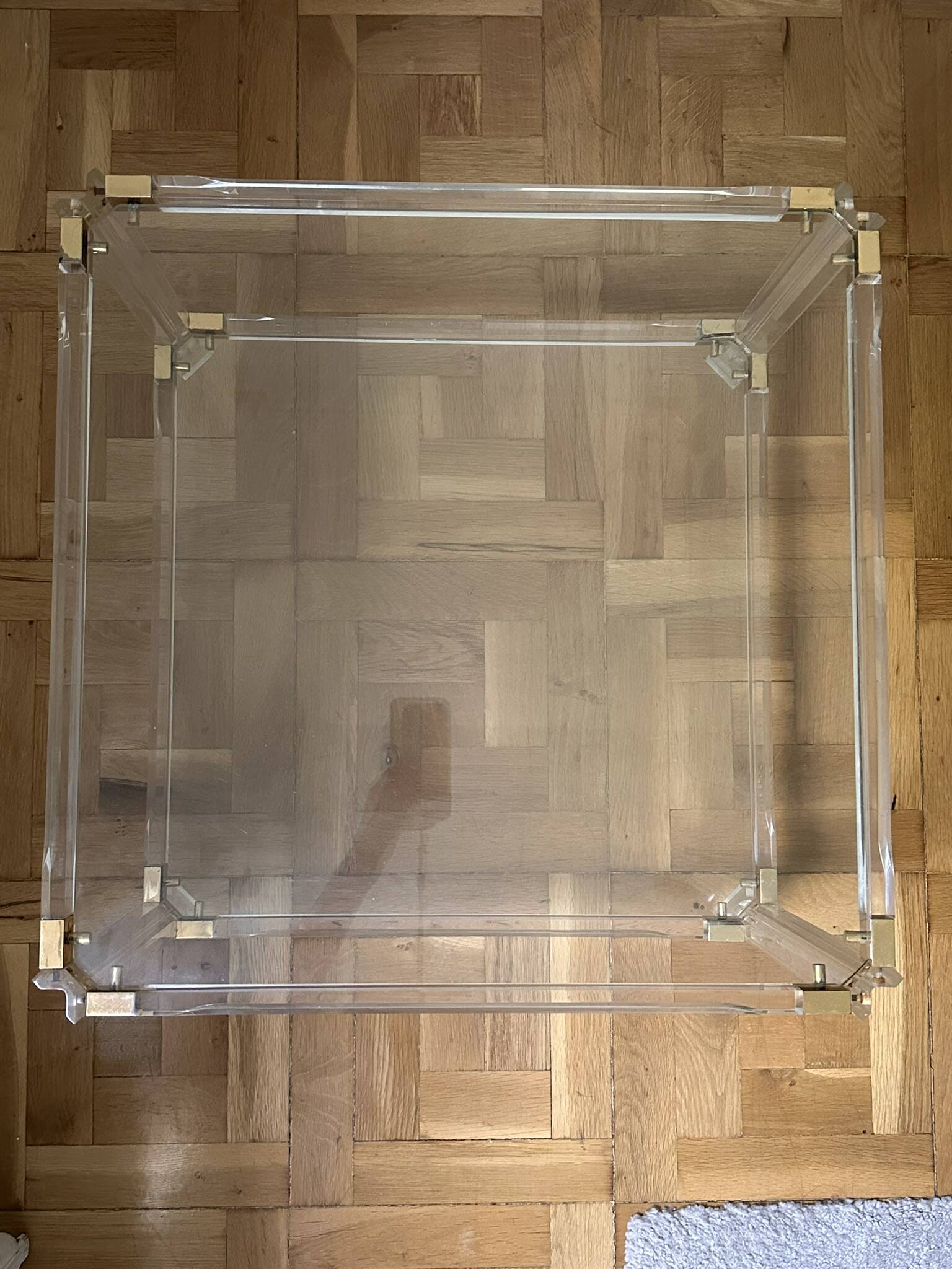 2 side tables in plexiglass, glass, and brass.
