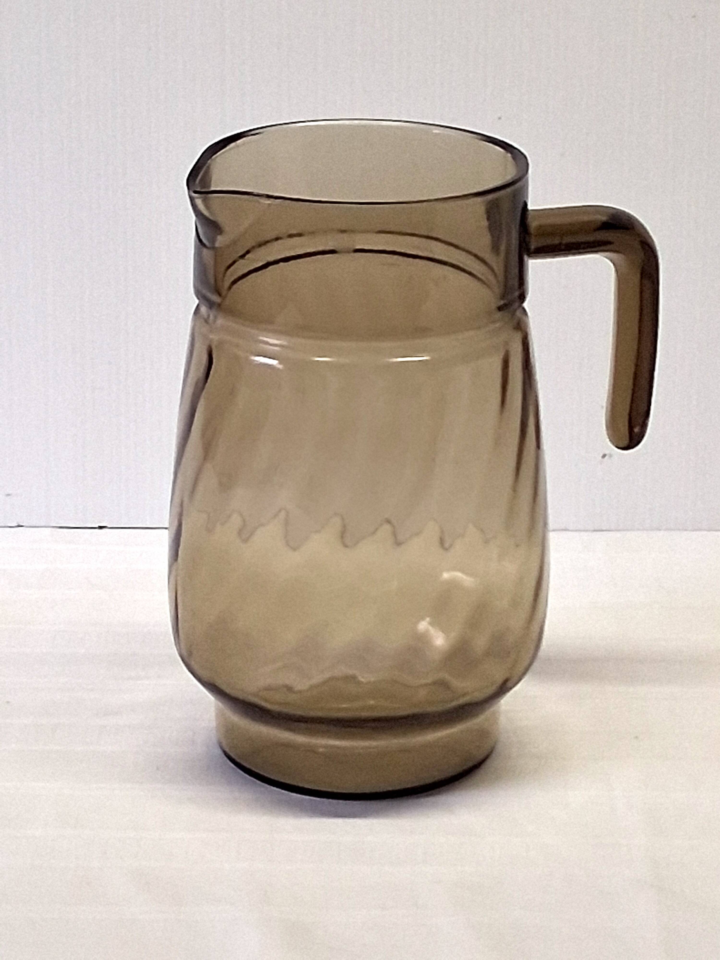 Very pretty black smoked glass pitcher from Lever in very good condition.