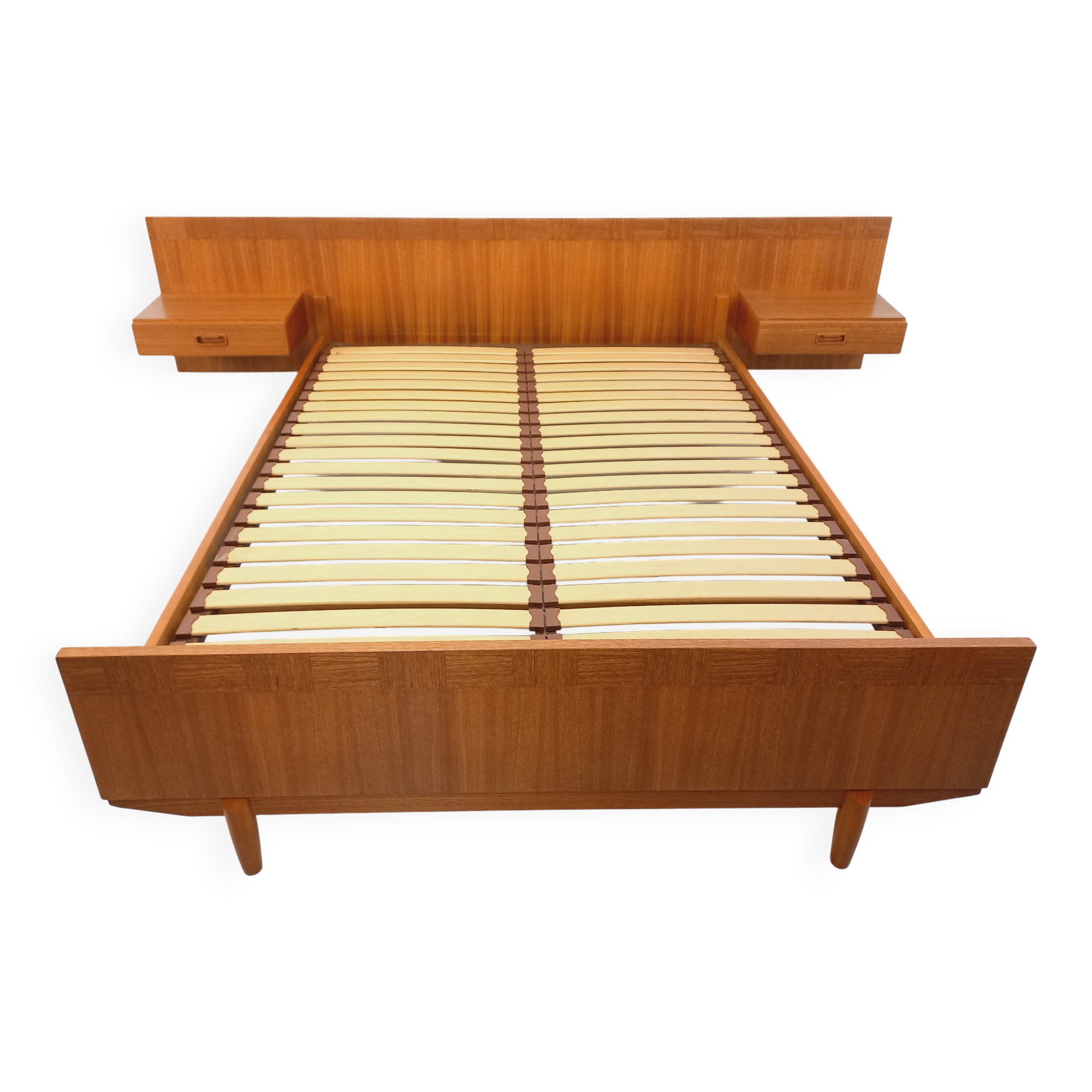 Double bed vintage Scandinavian in teak from the 1960s with integrated bedside tables.
