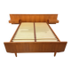 Double bed vintage Scandinavian in teak from the 1960s with integrated bedside tables.