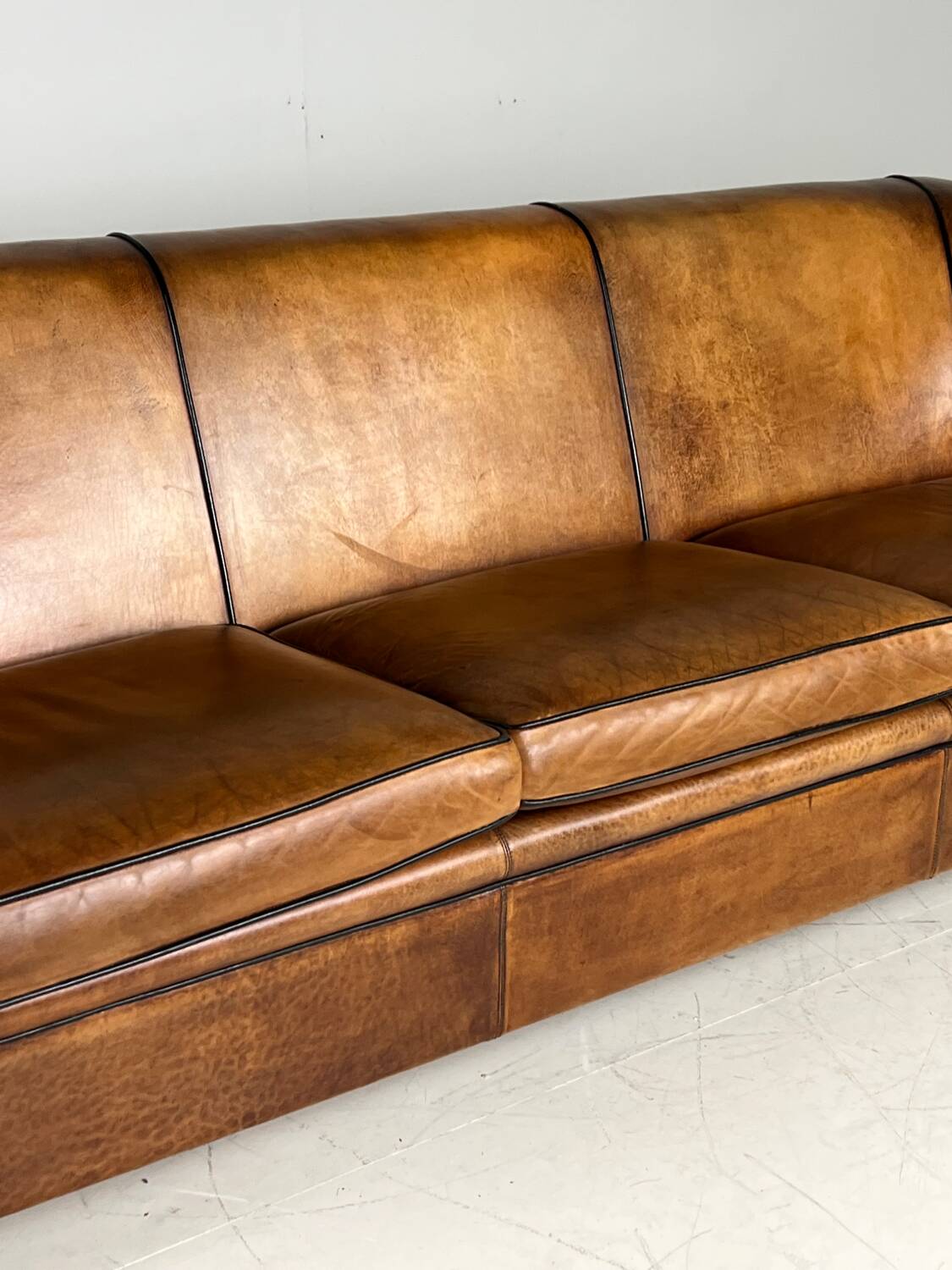 Art deco sofa sheep’s leather