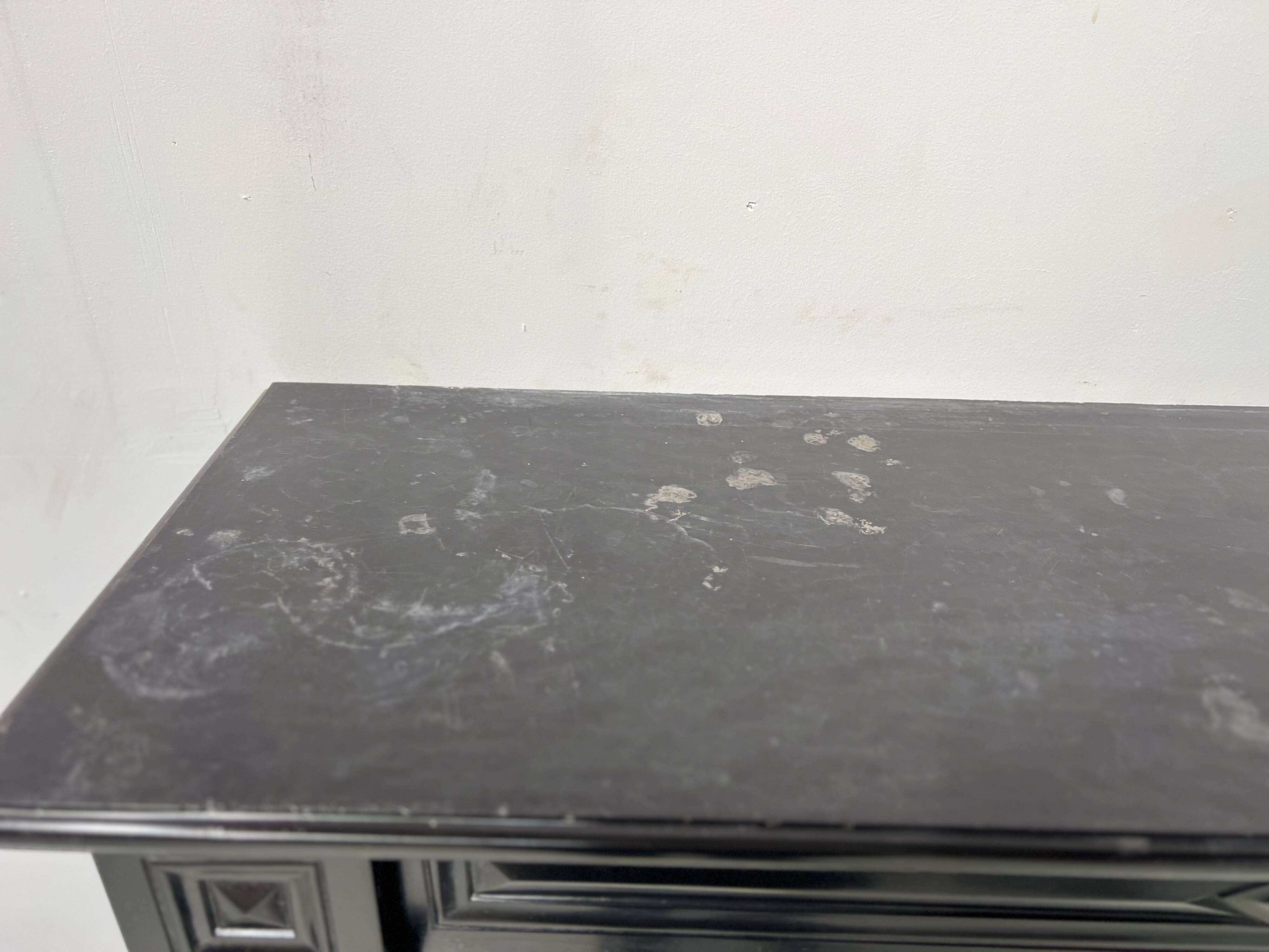 Napoleon III fireplace with claw feet in black marble, 19th century