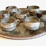 Enamelled stoneware tray and its 7 cups