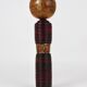Decorative Kokeshi doll sculpture from northern Japan, hand-painted, signed.