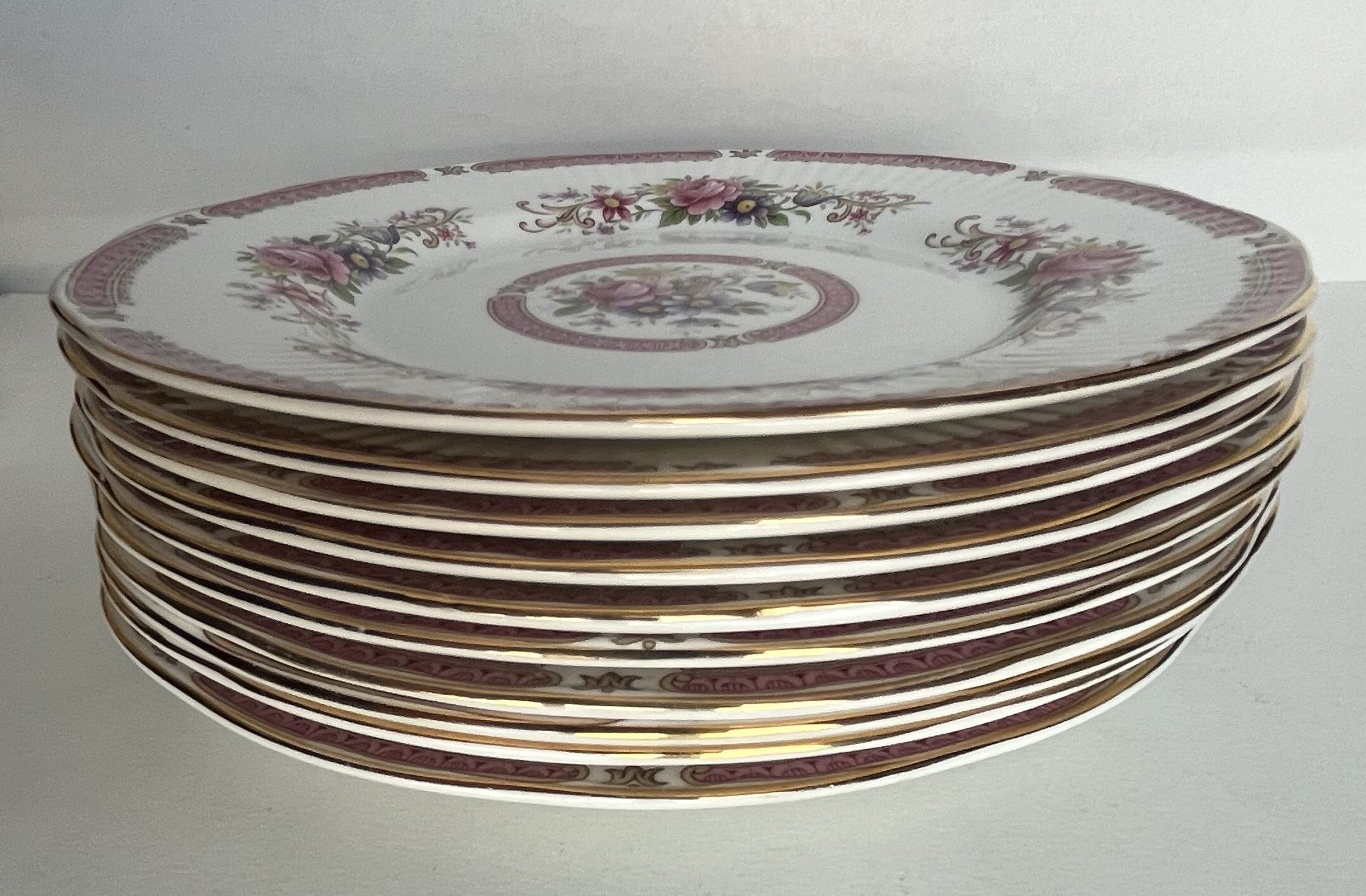 10 porcelain plates and a dish