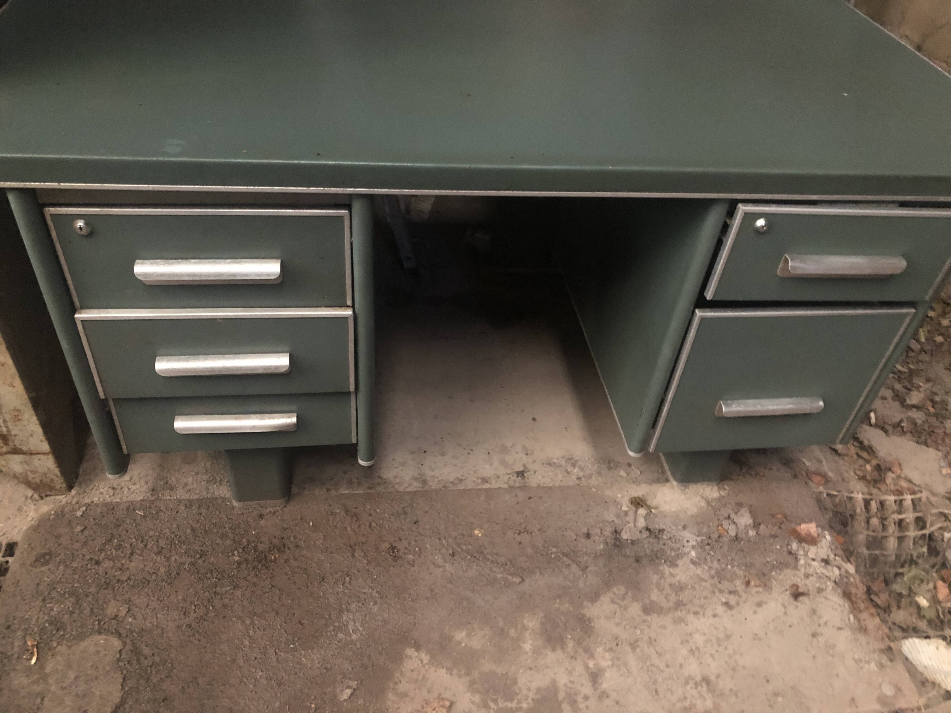 Old metal desk with chair