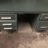 Old metal desk with chair