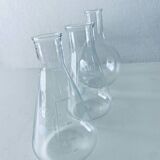 Set of three Pyrex glass chemistry bottles