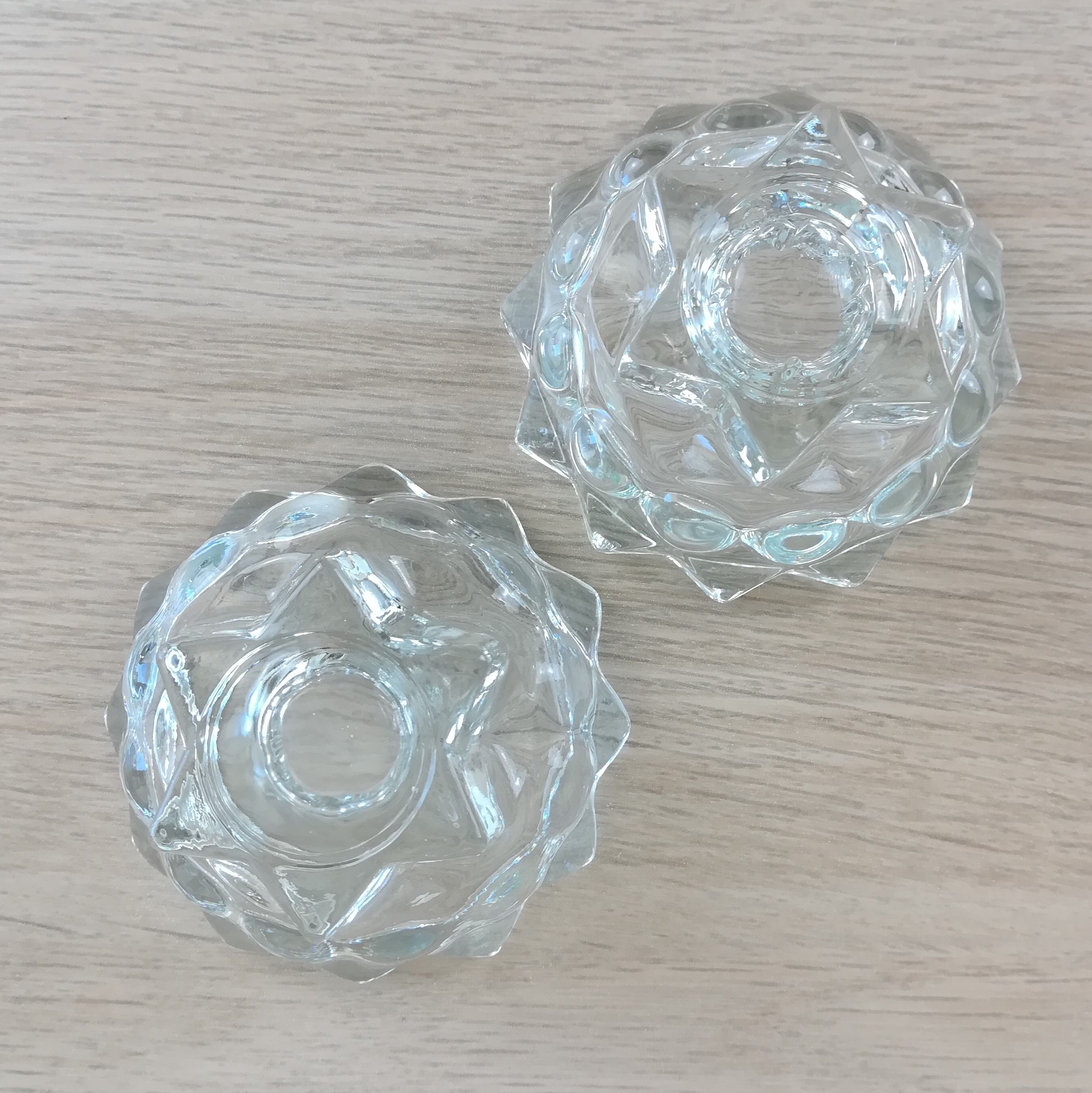 Pair of glass star candle holders