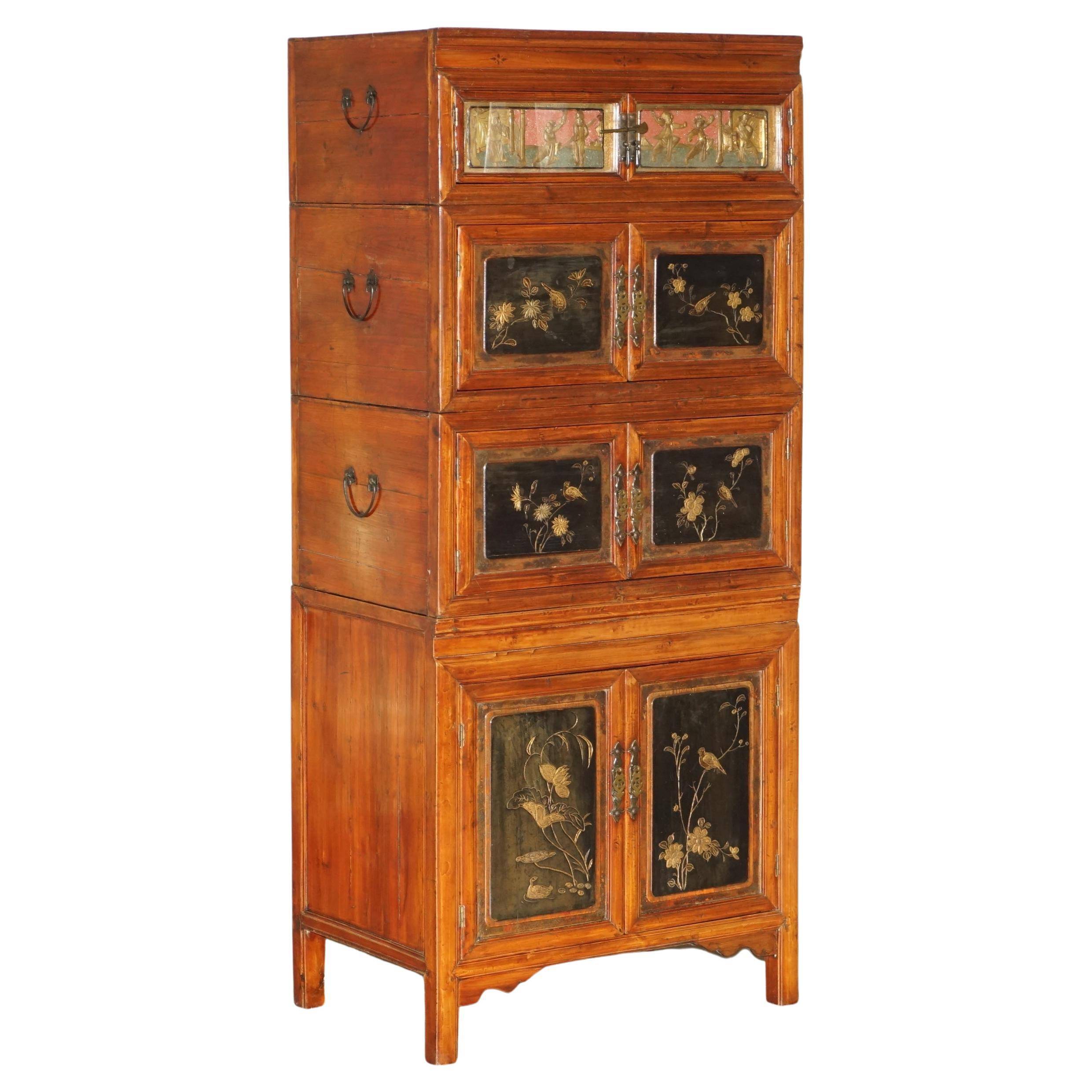 Antique Chinese armoire hand-carved around 1880 with country-style handles.