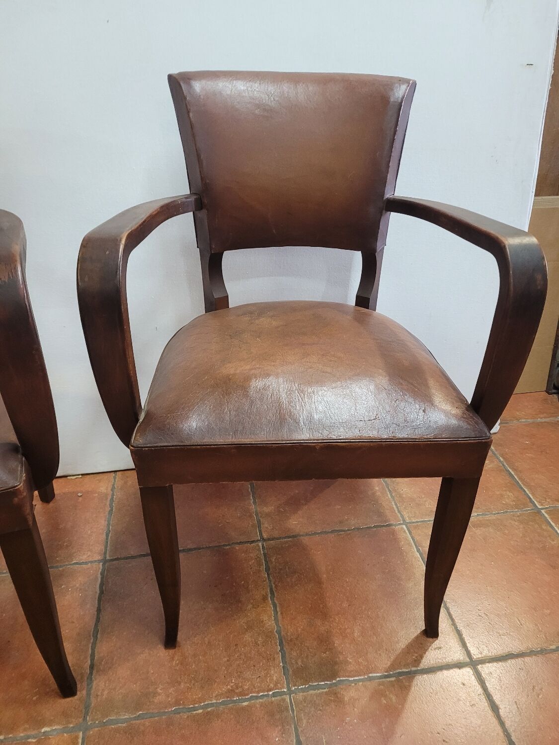 Pair of antique leather bridge armchairs