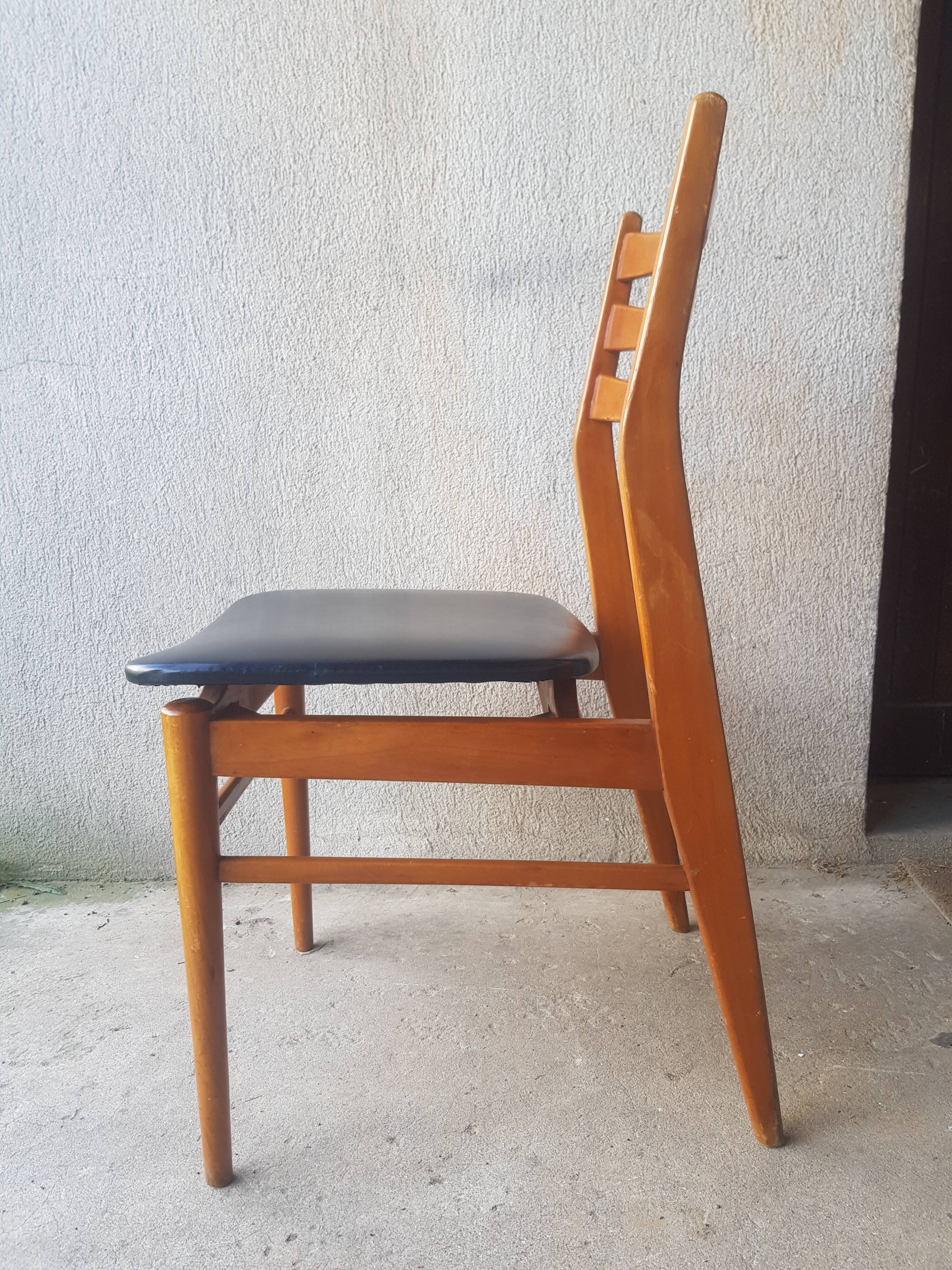 Teak and skai chair