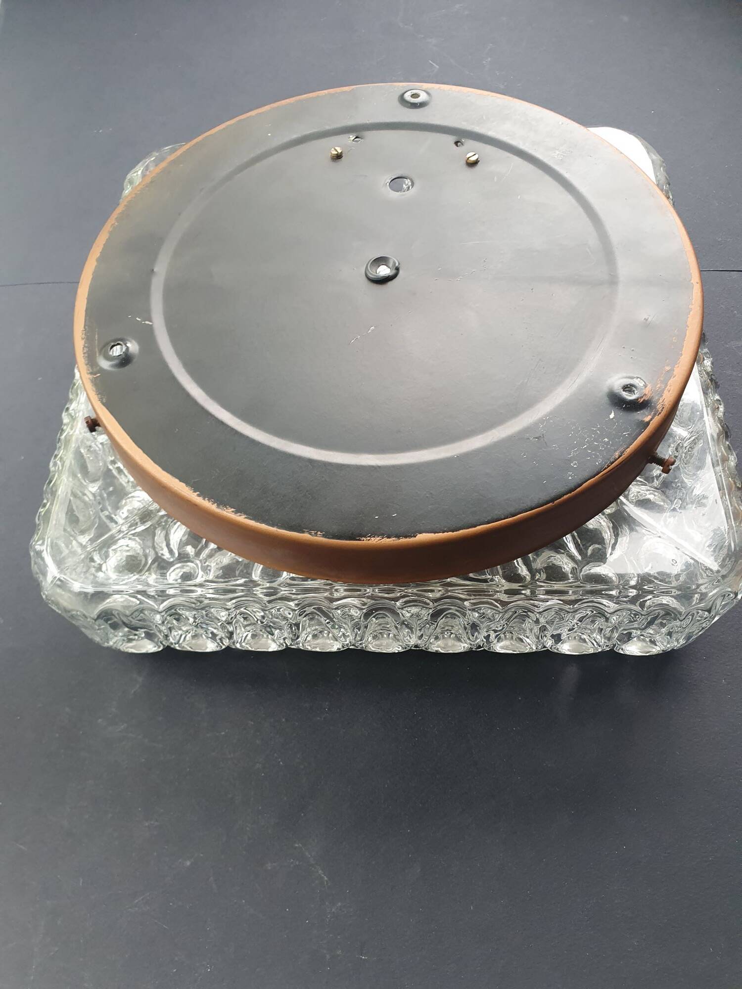 Large ceiling light or vintage wall sconce from the 1970s.