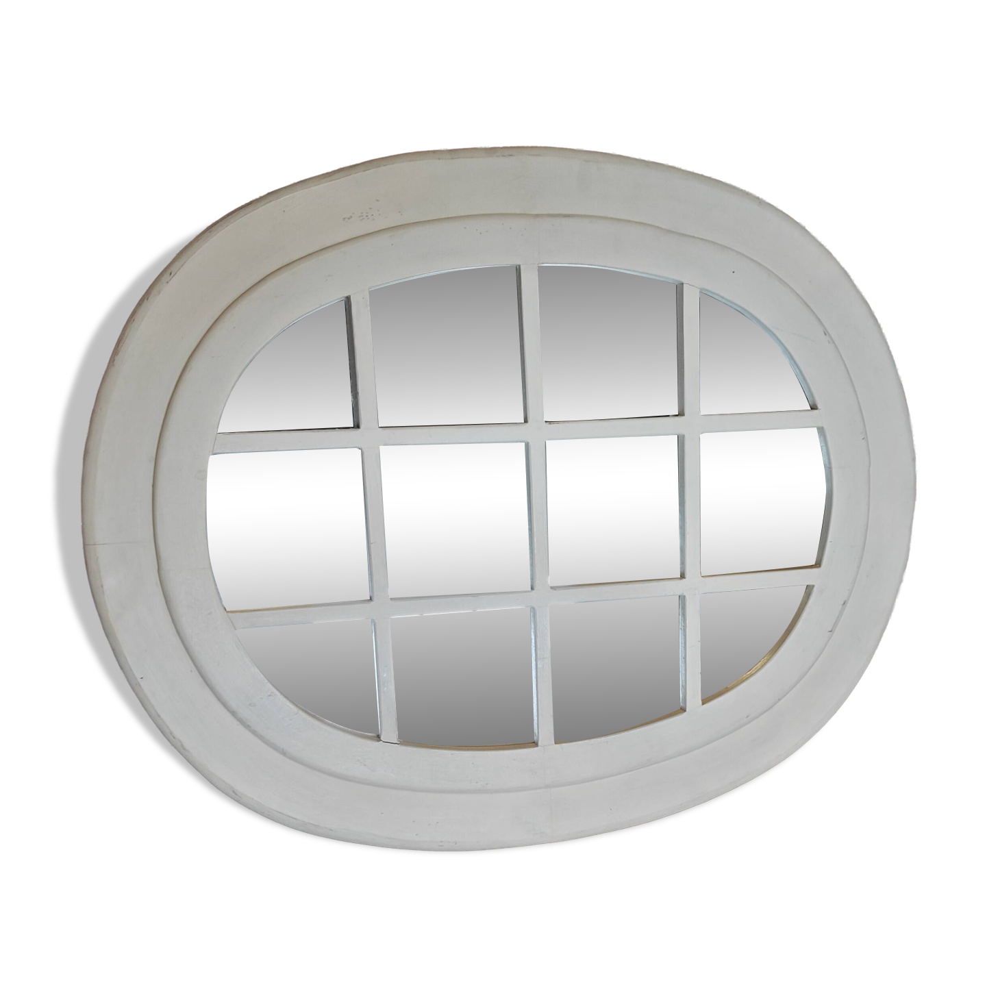Oval mirror in window style with wooden crossbars – chic country decor