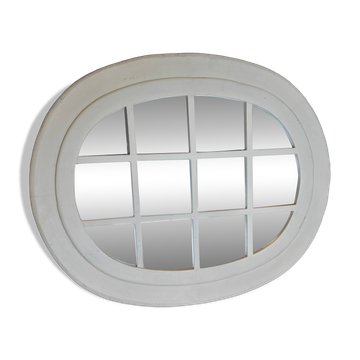 Oval mirror in window style with wooden crossbars – chic country decor