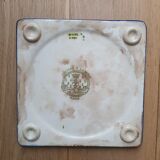 Trivet and Longwy enamel bottle