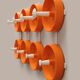 Orange spage age wall coat rack 1960s