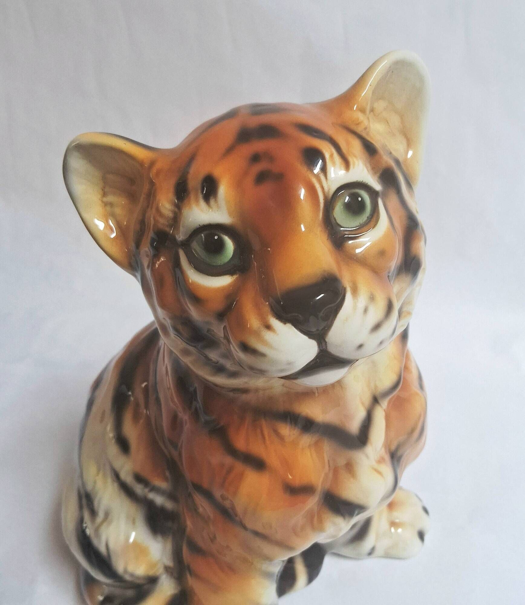 Vintage animal sculpture in Italian ceramic depicting a tiger cub.