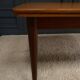 Scandinavian rectangular teak dining table with 4 tapered legs