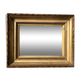 Mirror in stucco and gilded wood