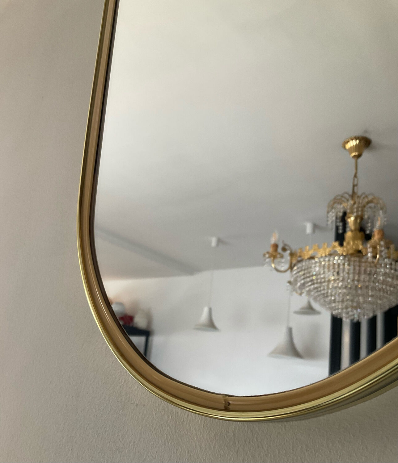 Asymmetrical free-form mirror from the 70s