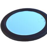 Round mirror in solid oak, bevelled, damaged, diameter 56cm.