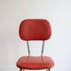 Set of 9 vintage retro chairs in red faux leather.