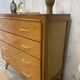 Commode aux pieds compas