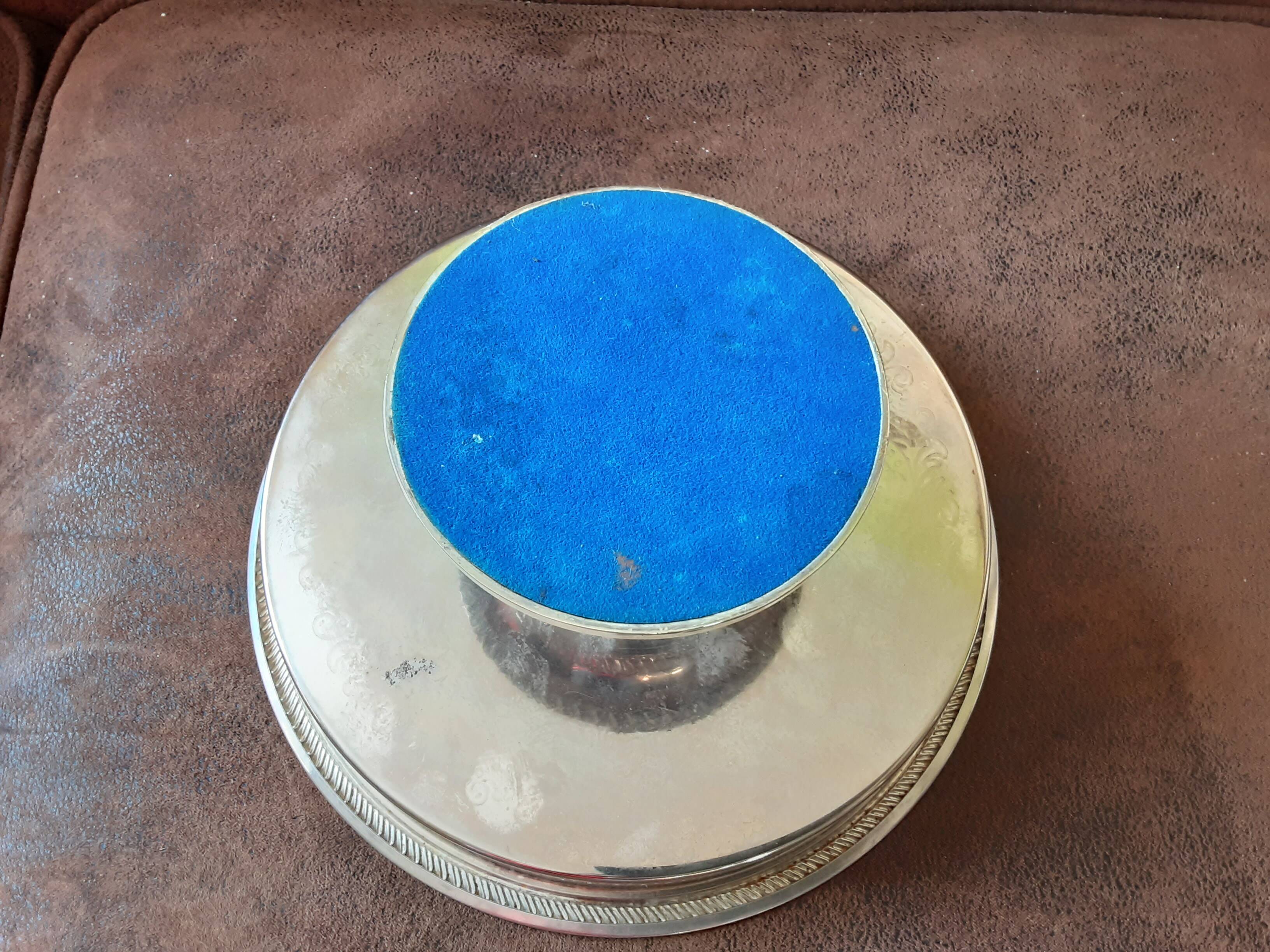 Old metal bowl on foot