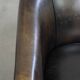 Fauteuil club noir/gris en cuir de mouton