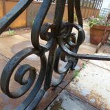 Marble table with wrought iron legs.