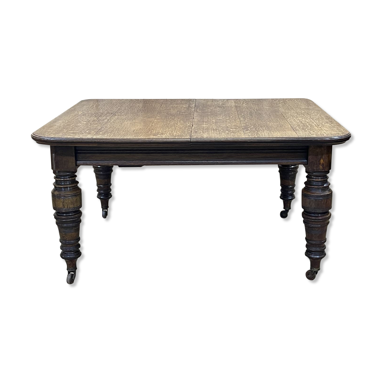 English nineteenth oak table with 1 crank extension